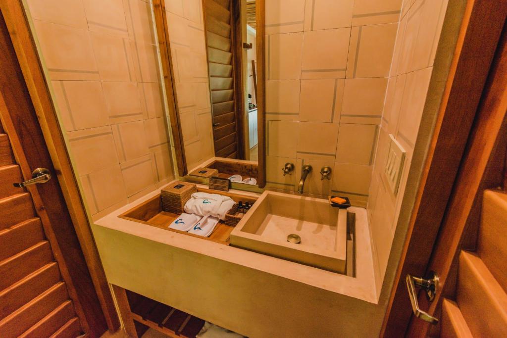 Koupelna v ubytování Hotel Carolina Bacalar