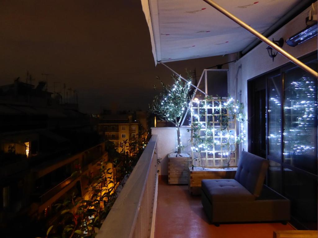 A seating area at Sophia's Penthouse Apartment With Jacuzzi and Acropolis View From Big Terrace