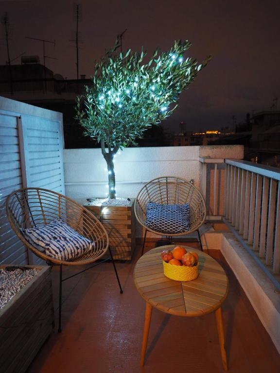 A balcony or terrace at Sophia's Penthouse Apartment With Jacuzzi and Acropolis View From Big Terrace