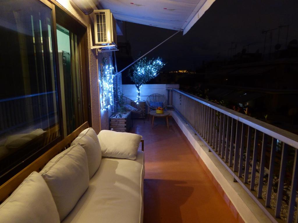 A seating area at Sophia's Penthouse Apartment With Jacuzzi and Acropolis View From Big Terrace