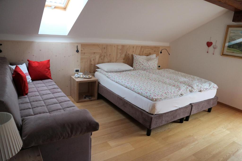 Postel nebo postele na pokoji v ubytování B&B Casa Riz