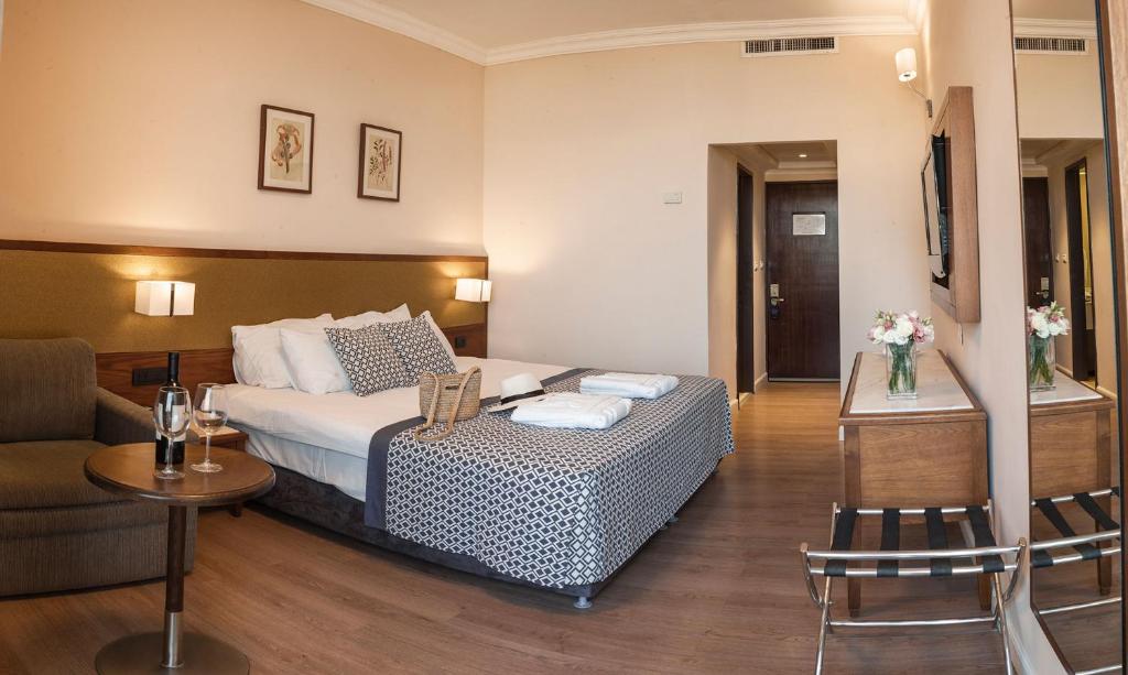 Posezení v ubytování Caesar Premier Tiberias Hotel