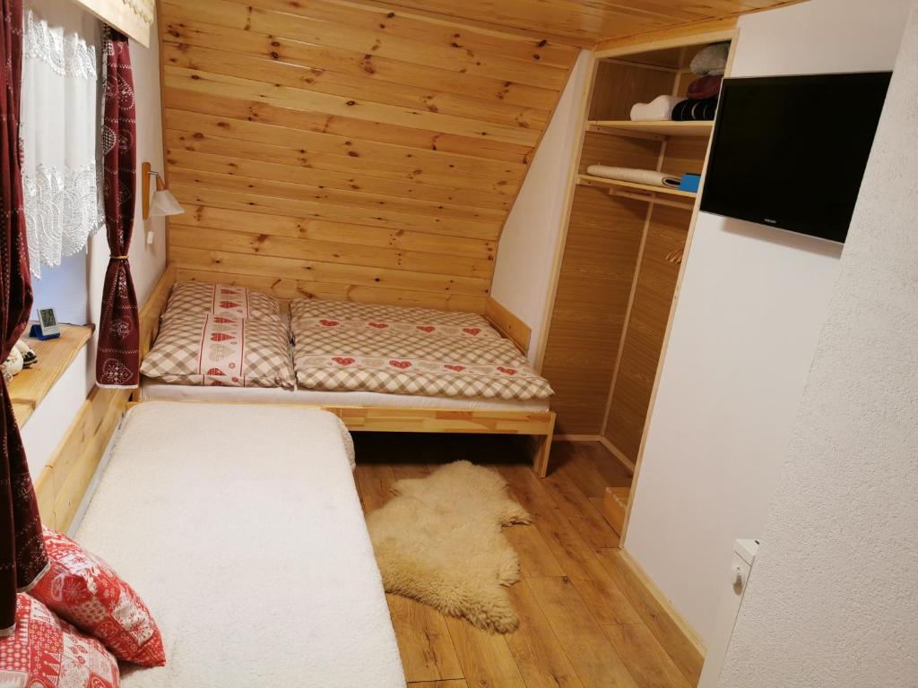 TV a/nebo společenská místnost v ubytování Chata Maco