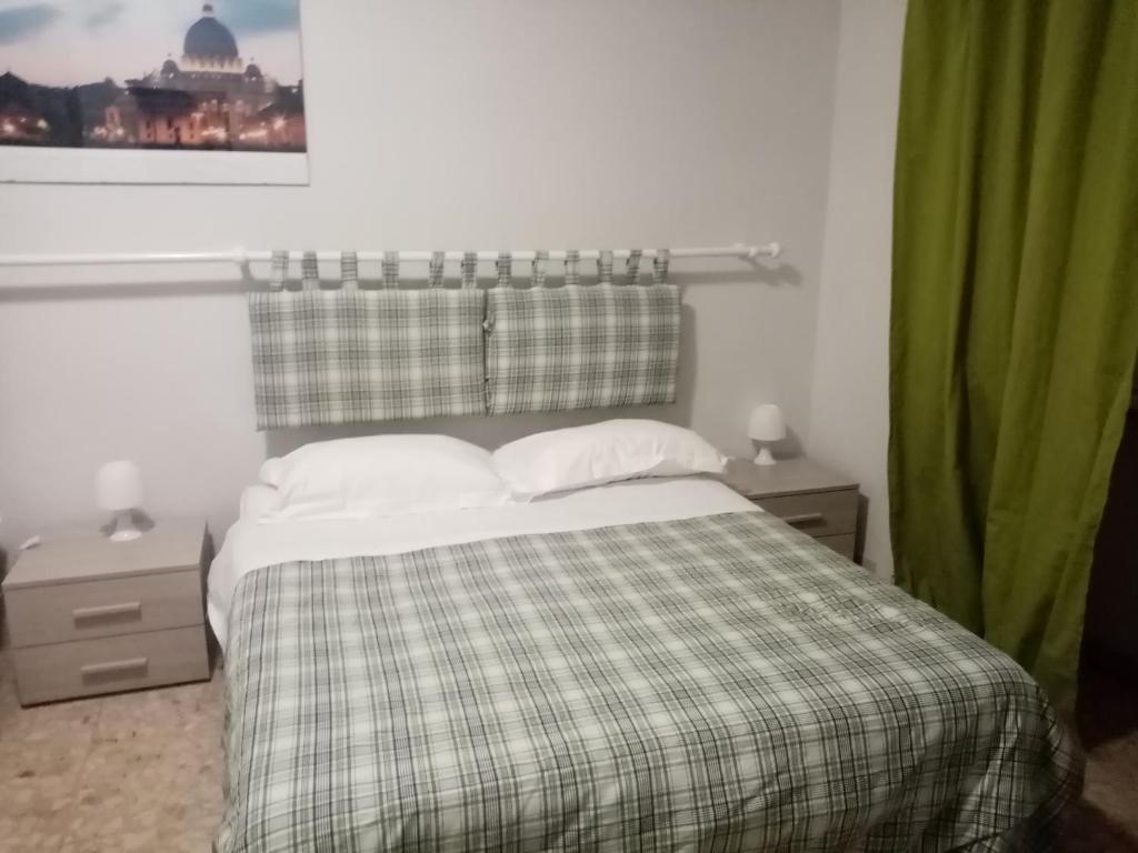 Posteľ alebo postele v izbe v ubytovaní Olimpica Relais guest house