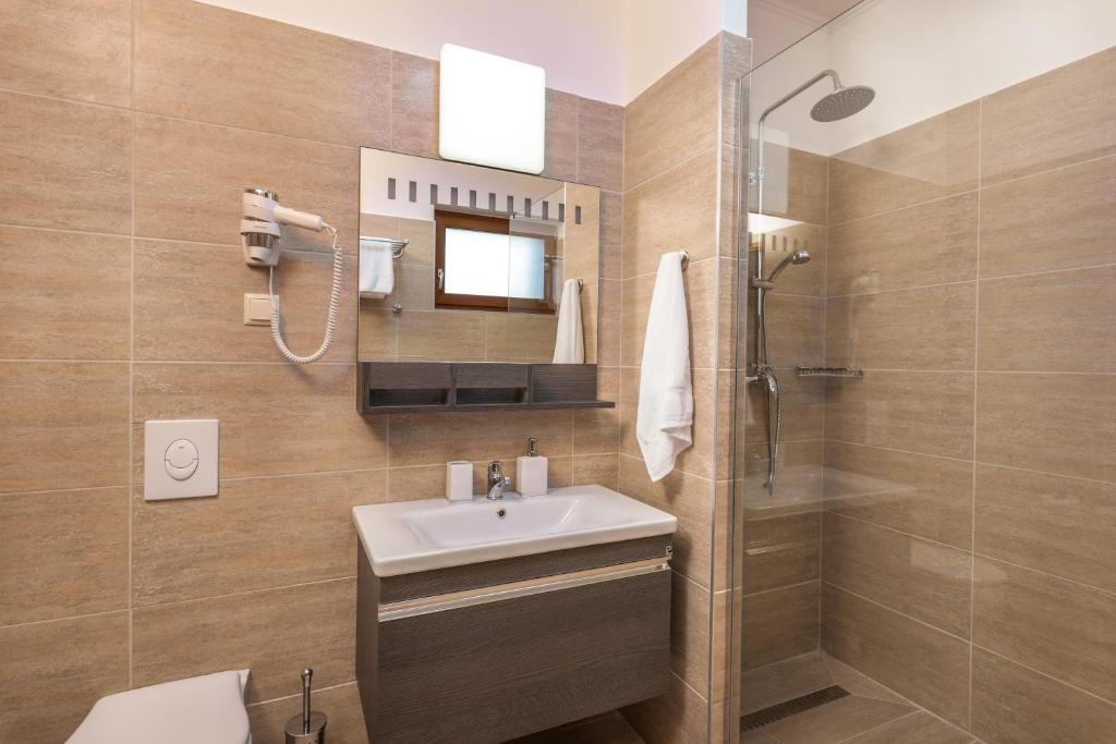 Koupelna v ubytování Hídfő Apartman-Nyugalom Szigetei
