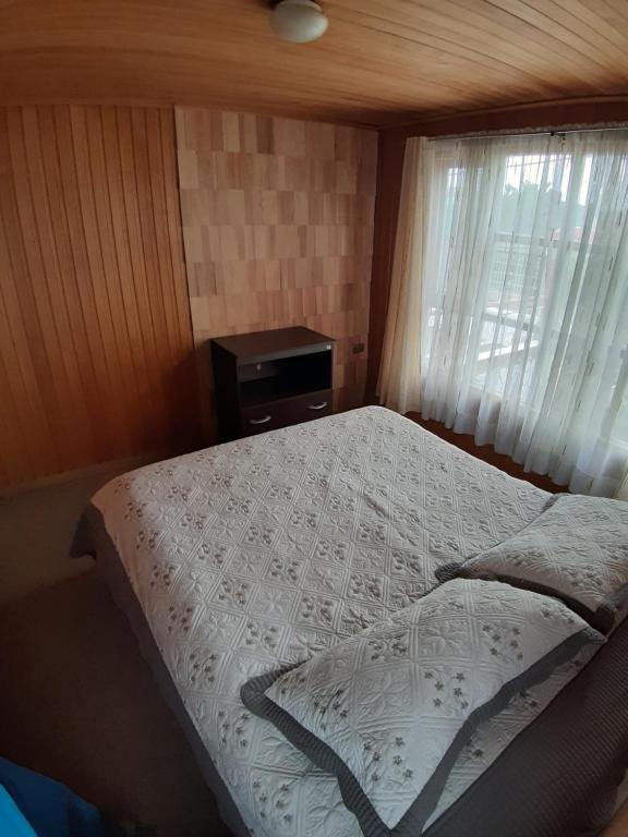 Postel nebo postele na pokoji v ubytování Cabañas Don Foncho