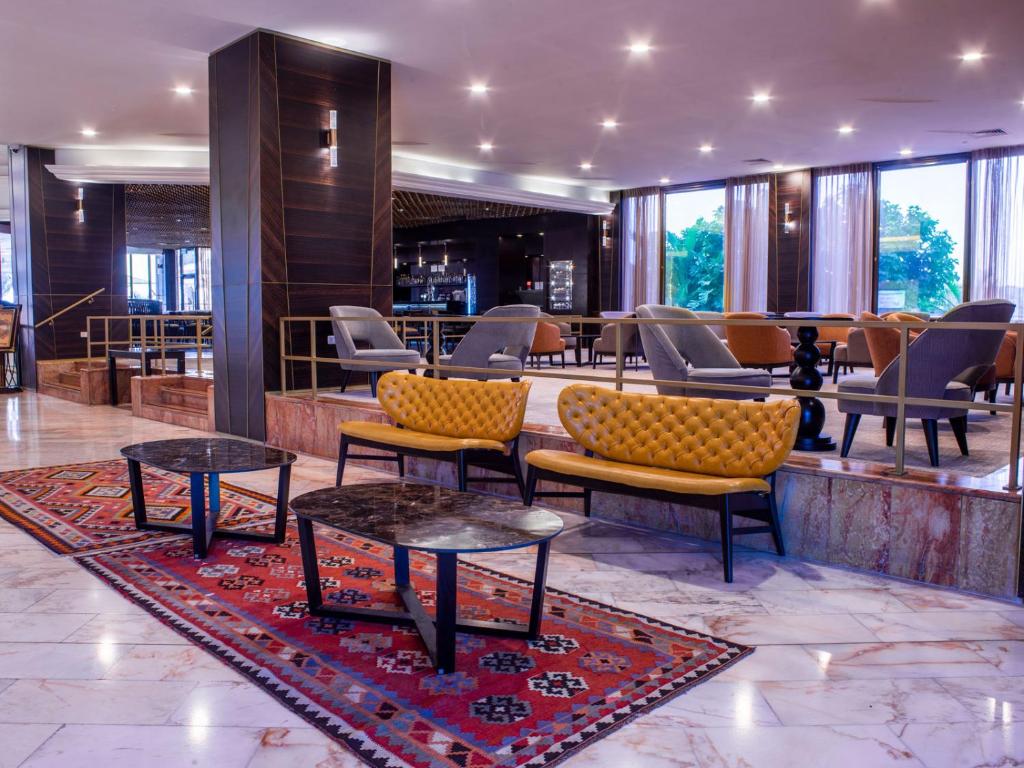 Posezení v ubytování Caesar Premier Tiberias Hotel