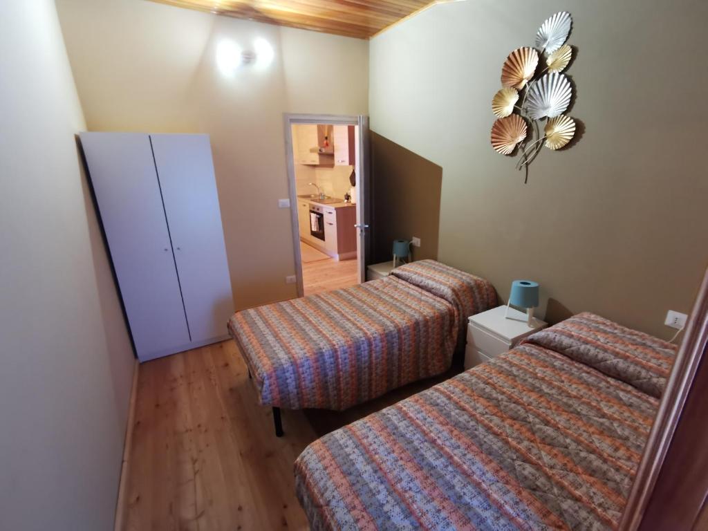 Posteľ alebo postele v izbe v ubytovaní Casa Curnet