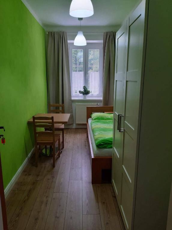 Postel nebo postele na pokoji v ubytování Lipanka
