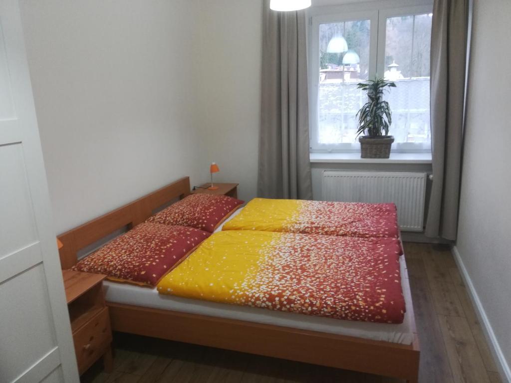 Postel nebo postele na pokoji v ubytování Lipanka