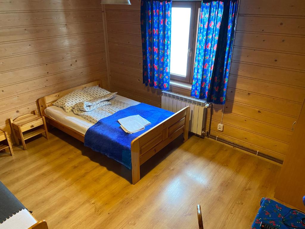 Posteľ alebo postele v izbe v ubytovaní Willa Huragan