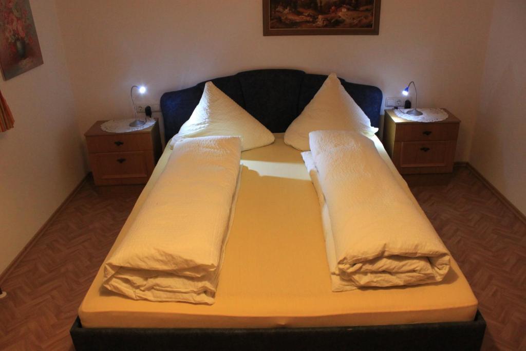 Postel nebo postele na pokoji v ubytování Pension & Restaurant TsingDao
