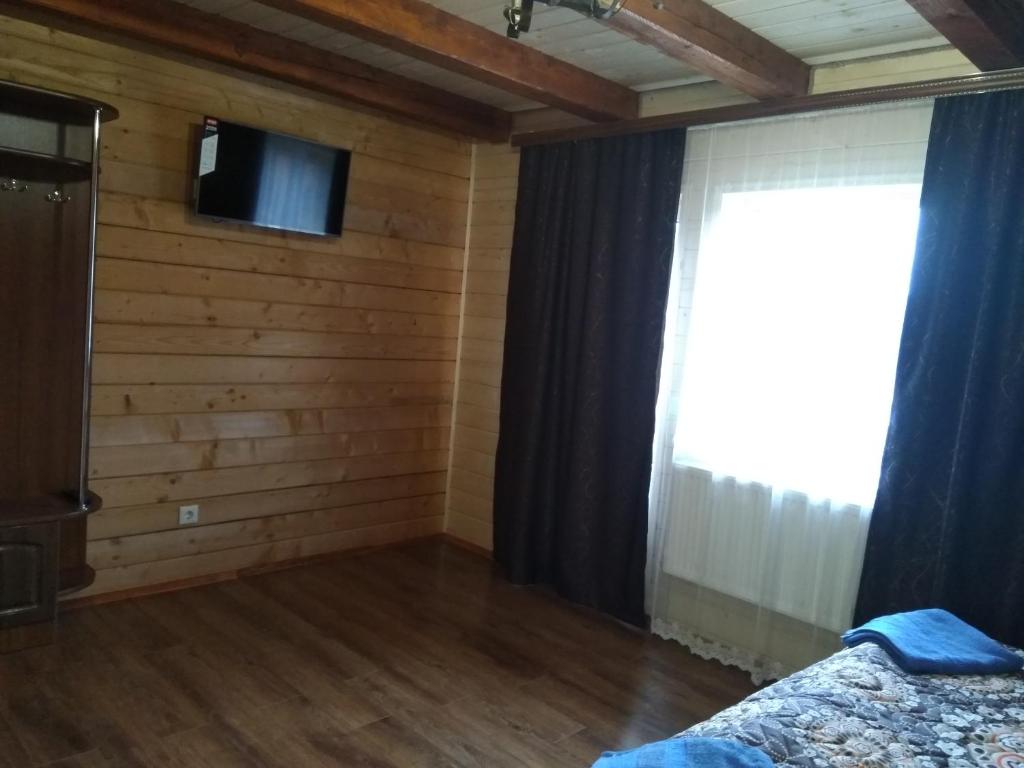 TV a/nebo společenská místnost v ubytování Sadyba Geredzhuka
