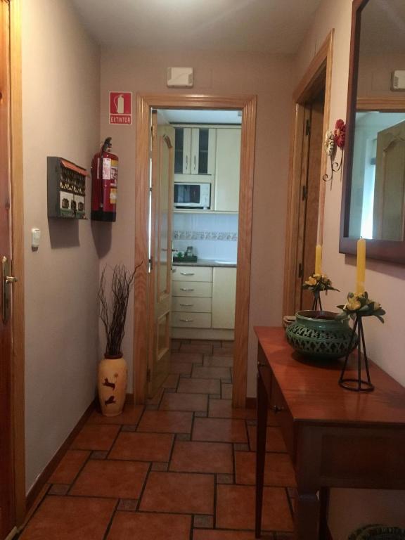 Televízia a/alebo spoločenská miestnosť v ubytovaní Alojamiento Rural Fuente De La Glorieta