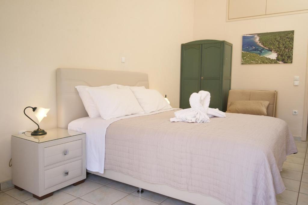 Postel nebo postele na pokoji v ubytování Aegealis Studios