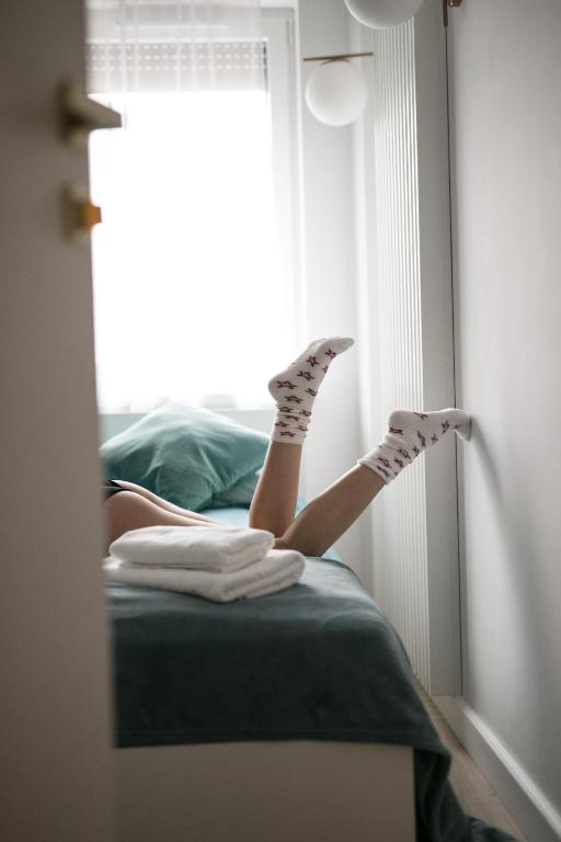 Posteľ alebo postele v izbe v ubytovaní Apartament Różana