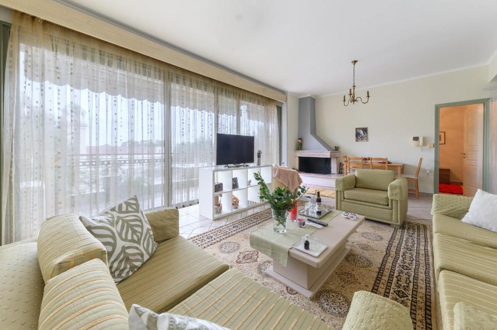 Televízia a/alebo spoločenská miestnosť v ubytovaní 3BD Apartment in the Center - Self check in