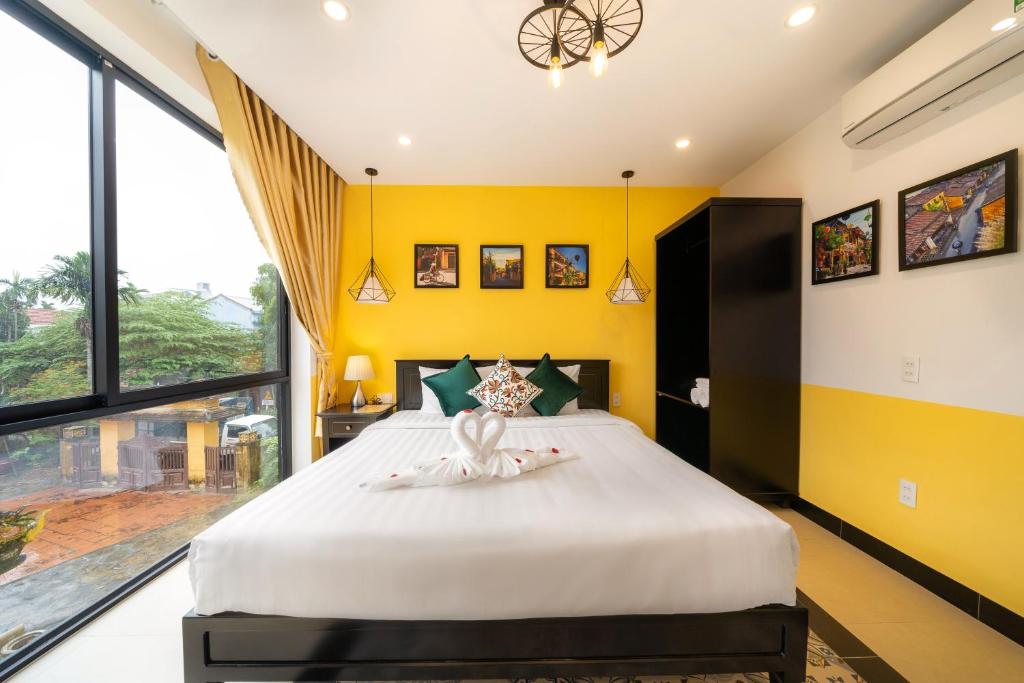 Postel nebo postele na pokoji v ubytování Coco Viet Homestay
