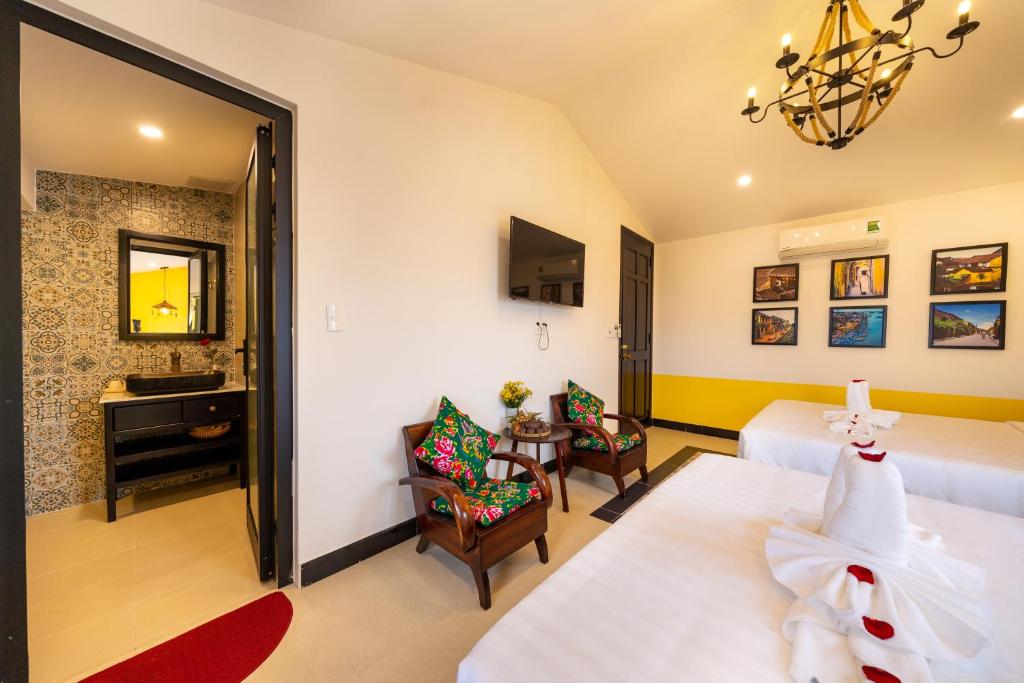 Postel nebo postele na pokoji v ubytování Coco Viet Homestay