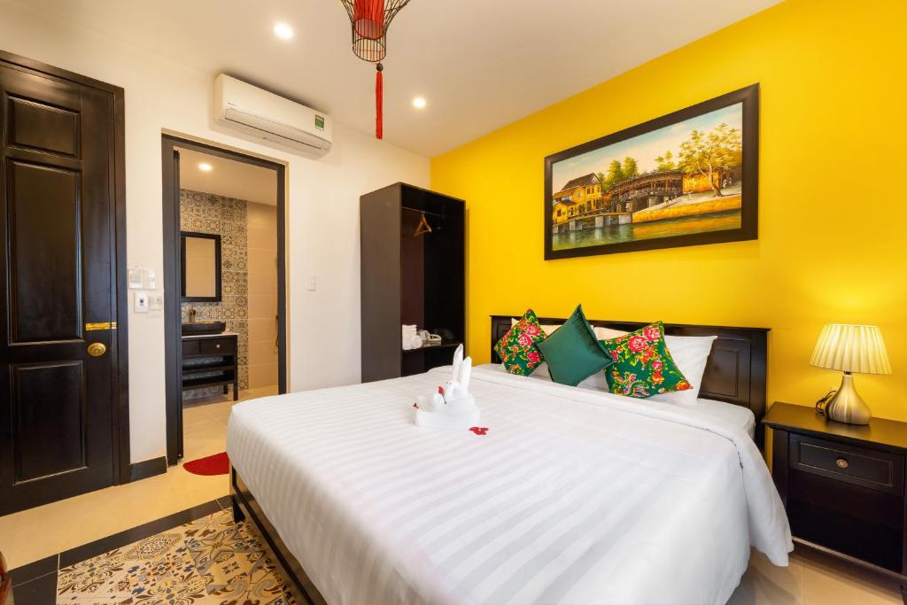 Postel nebo postele na pokoji v ubytování Coco Viet Homestay