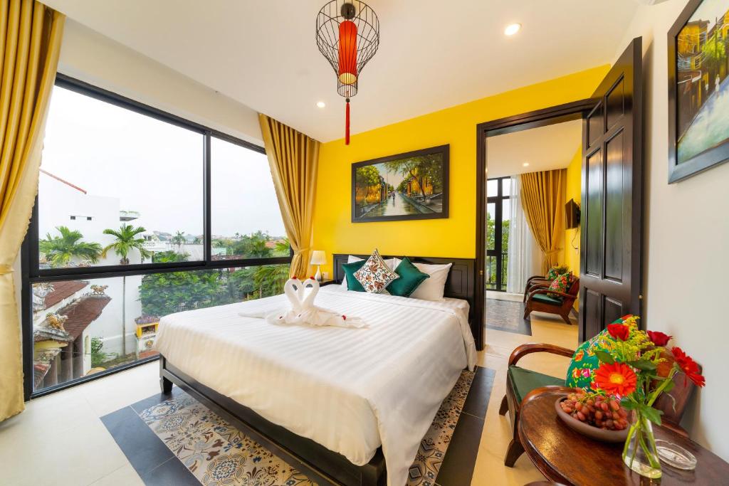 Postel nebo postele na pokoji v ubytování Coco Viet Homestay