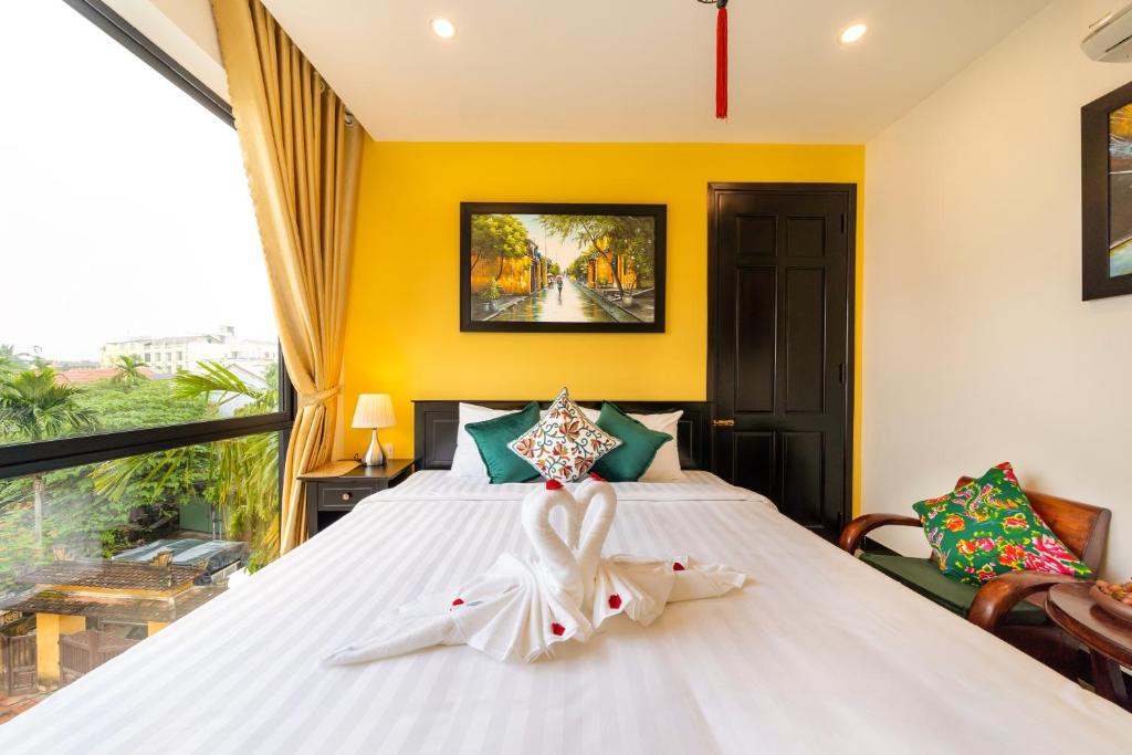 Postel nebo postele na pokoji v ubytování Coco Viet Homestay