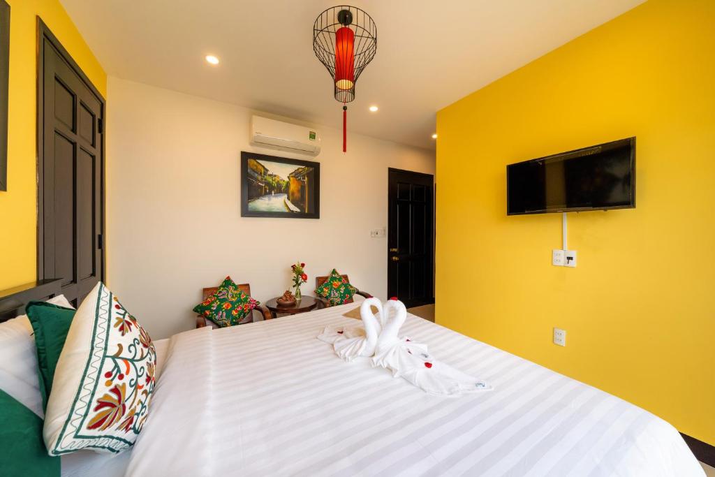 Postel nebo postele na pokoji v ubytování Coco Viet Homestay
