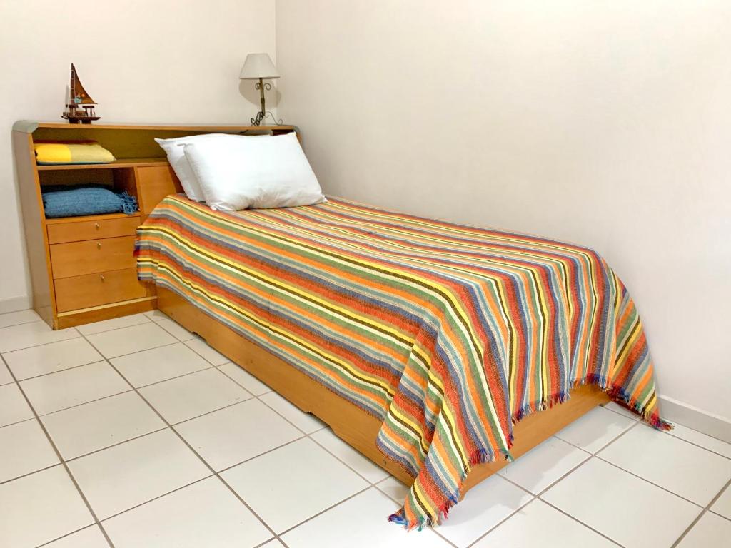  Apto 2 QTs c Garagem e Piscina no Centro