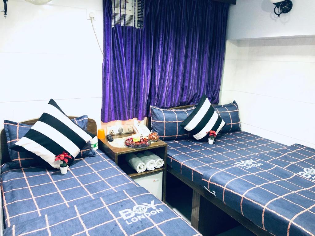 Postel nebo postele na pokoji v ubytování Premium Lounge