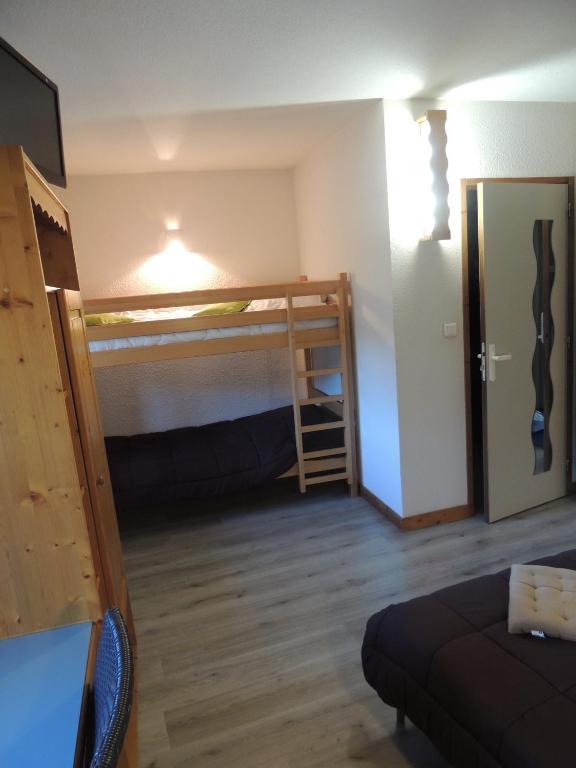 Postel nebo postele na pokoji v ubytování Hôtel de La Vallée