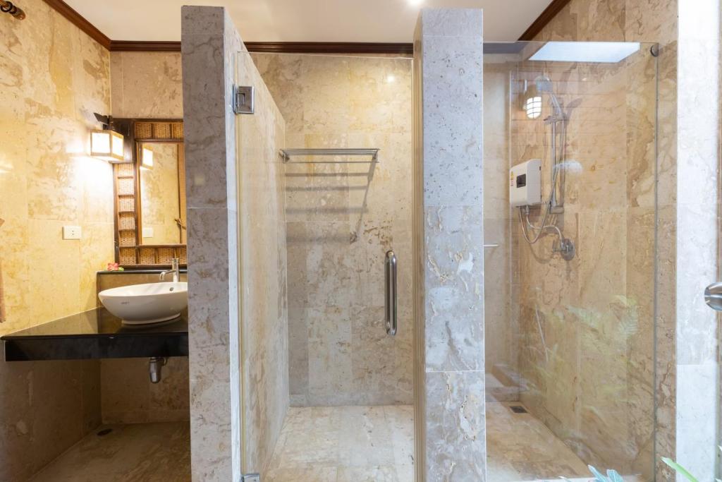 Koupelna v ubytování Banpu Resort Trat