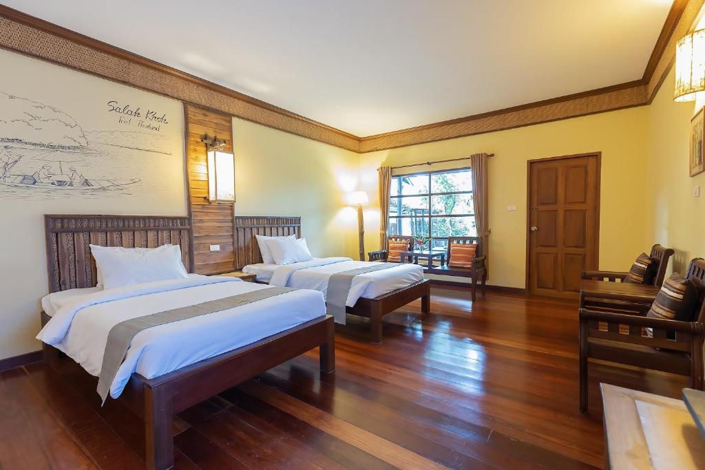 Postel nebo postele na pokoji v ubytování Banpu Resort Trat