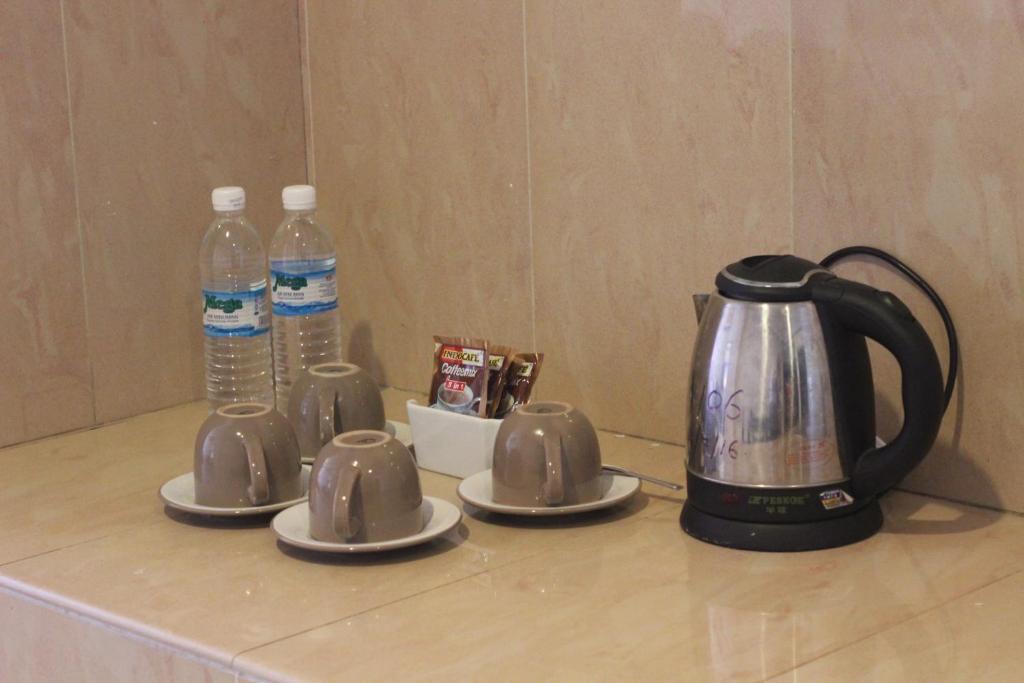 Příslušenství pro přípravu čaje a kávy v ubytování Grace Hotel Lahad Datu