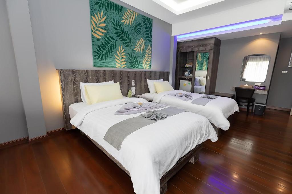 Postel nebo postele na pokoji v ubytování Banpu Resort Trat