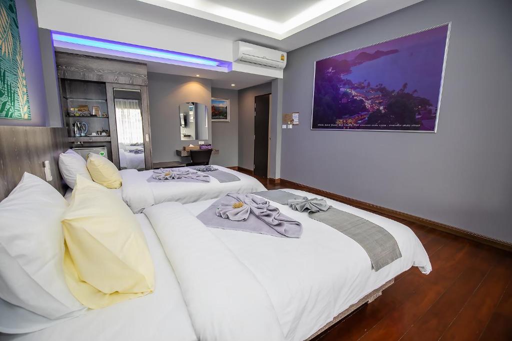 Postel nebo postele na pokoji v ubytování Banpu Resort Trat