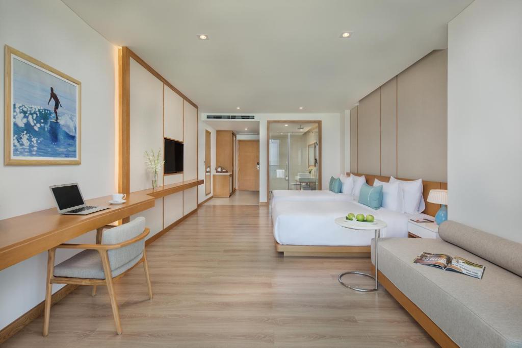 TV a/nebo společenská místnost v ubytování TMS Hotel Da Nang Beach