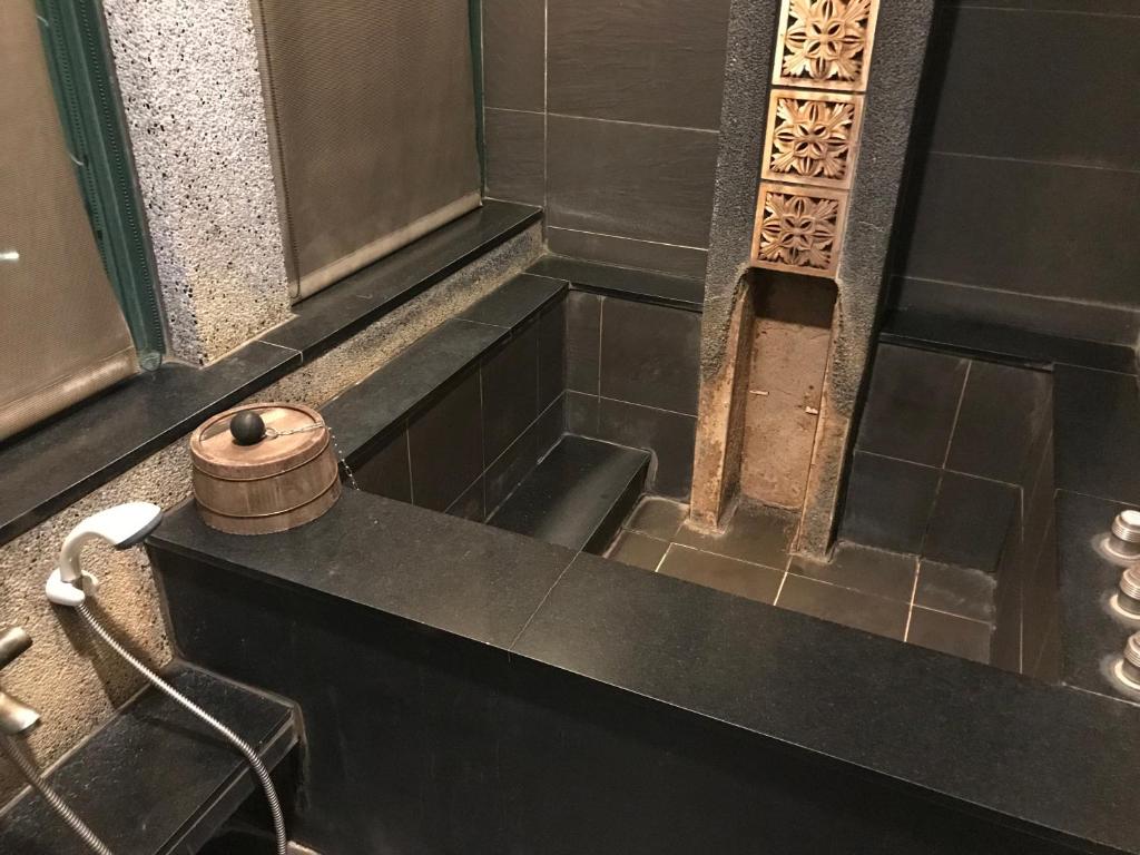 Koupelna v ubytování Shan-Yue Hotspring Hotel