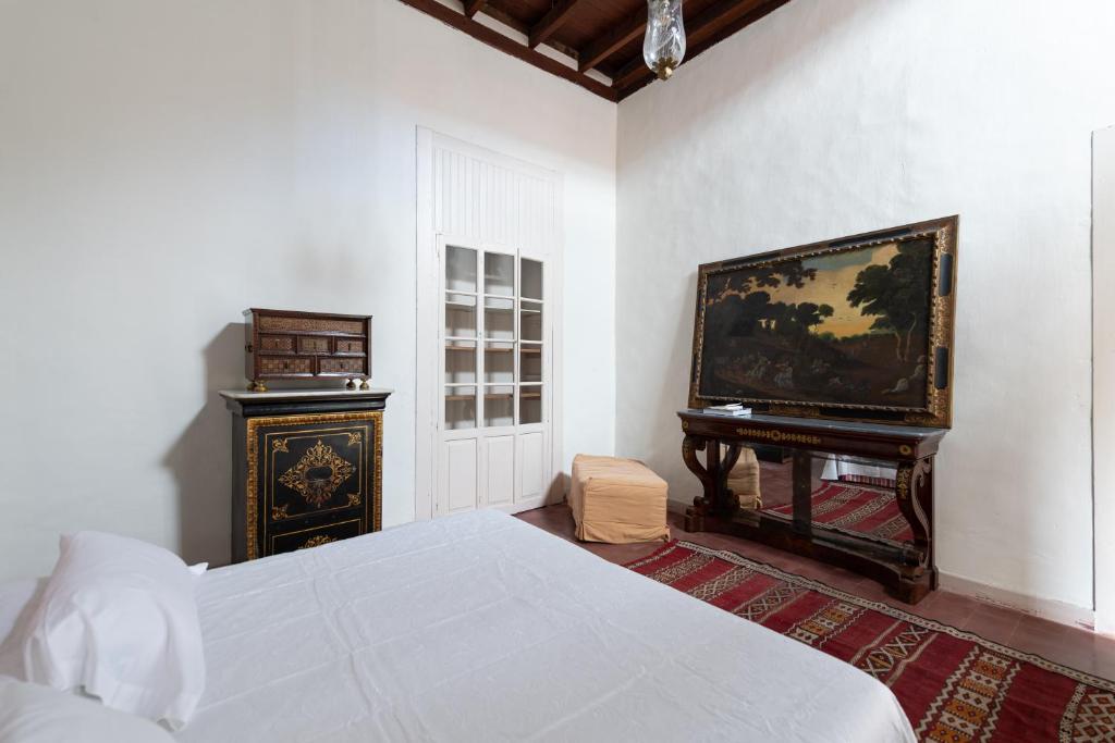 Posteľ alebo postele v izbe v ubytovaní Villa Hacienda del Batán