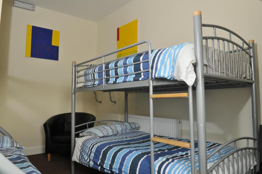 Postel nebo postele na pokoji v ubytování The Hostel