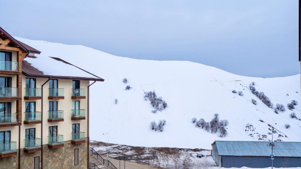 Nespecifikovaný výhled na hory nebo výhled na hory při pohledu z apartmánu