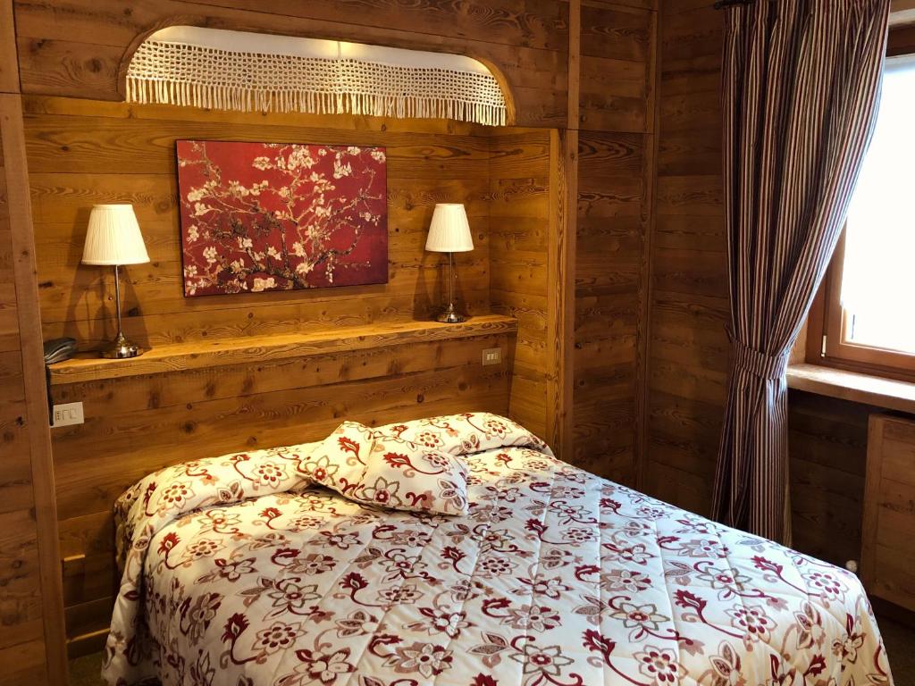 Postel nebo postele na pokoji v ubytování Hotel Ruitor