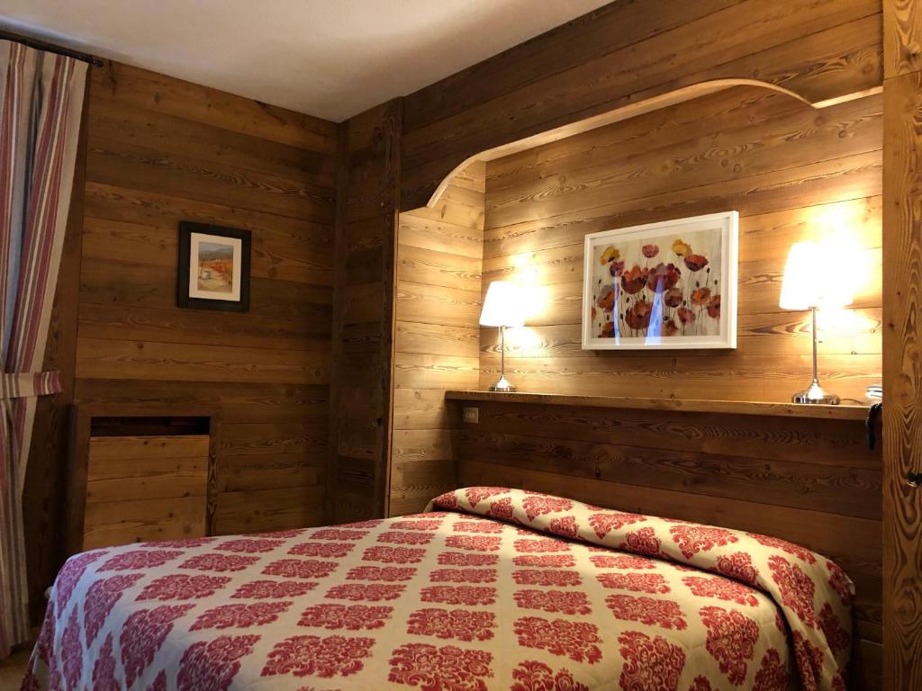 Postel nebo postele na pokoji v ubytování Hotel Ruitor