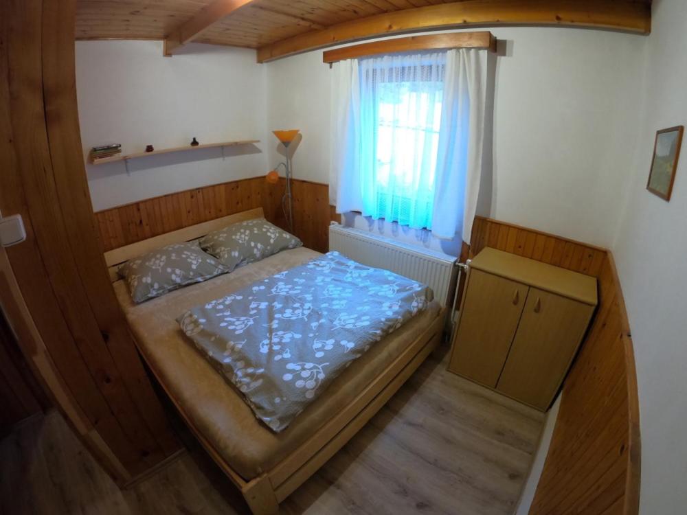 Postel nebo postele na pokoji v ubytování Apartmán U Sjezdovky