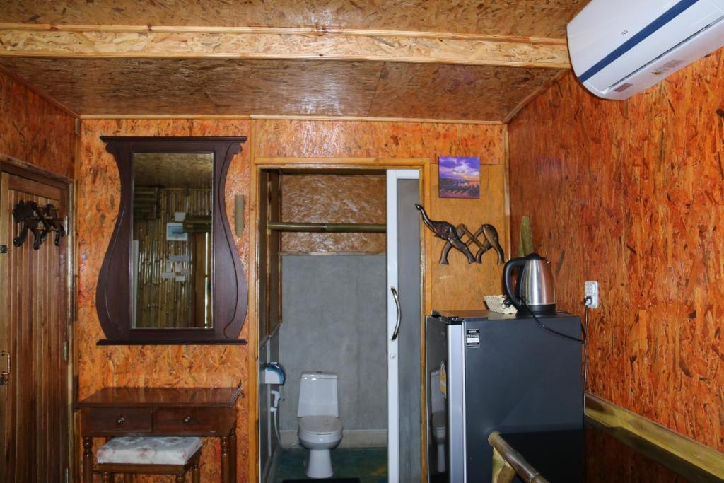 Kuchyň nebo kuchyňský kout v ubytování Ruan Mai Naiyang Beach Resort