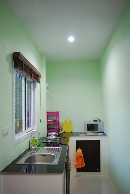 Kuchyň nebo kuchyňský kout v ubytování Anacar Bungalows
