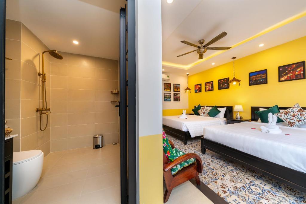 Postel nebo postele na pokoji v ubytování Coco Viet Homestay
