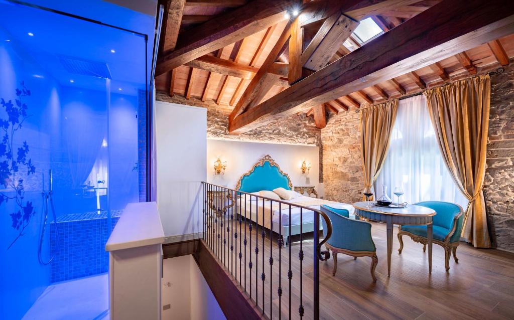 TV a/nebo společenská místnost v ubytování Agri Resort & SPA Le Colline del Paradiso