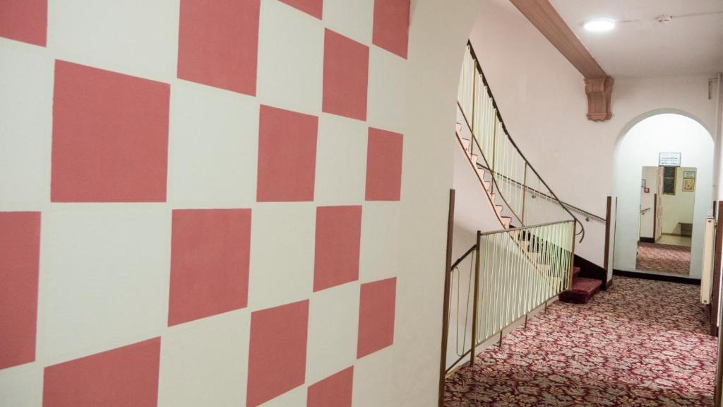 Postel nebo postele na pokoji v ubytování Hotel Hadrigan