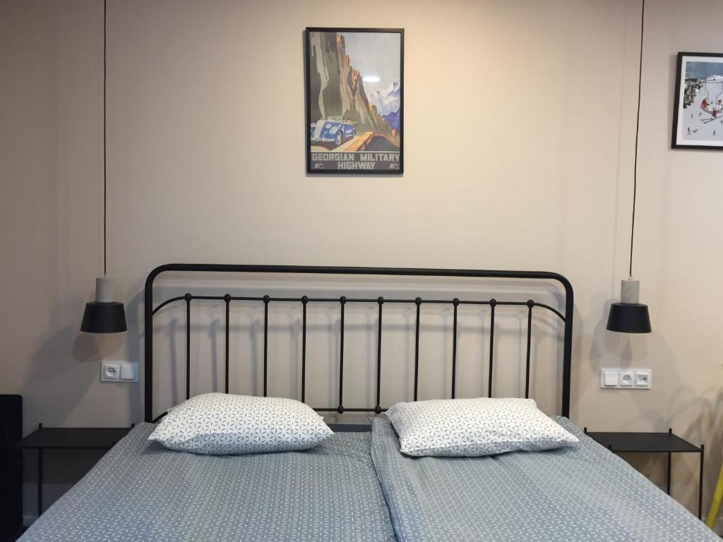Postel nebo postele na pokoji v ubytování New Gudauri; Loft 2, #222.
