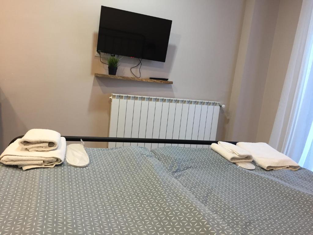 Postel nebo postele na pokoji v ubytování New Gudauri; Loft 2, #222.